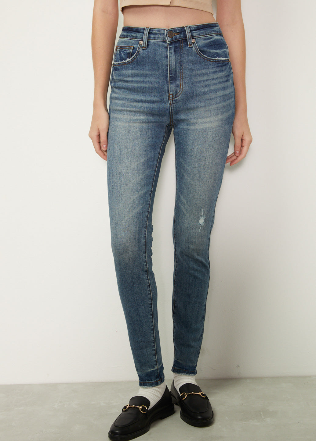 HIGH RISE SKINNY JEANS