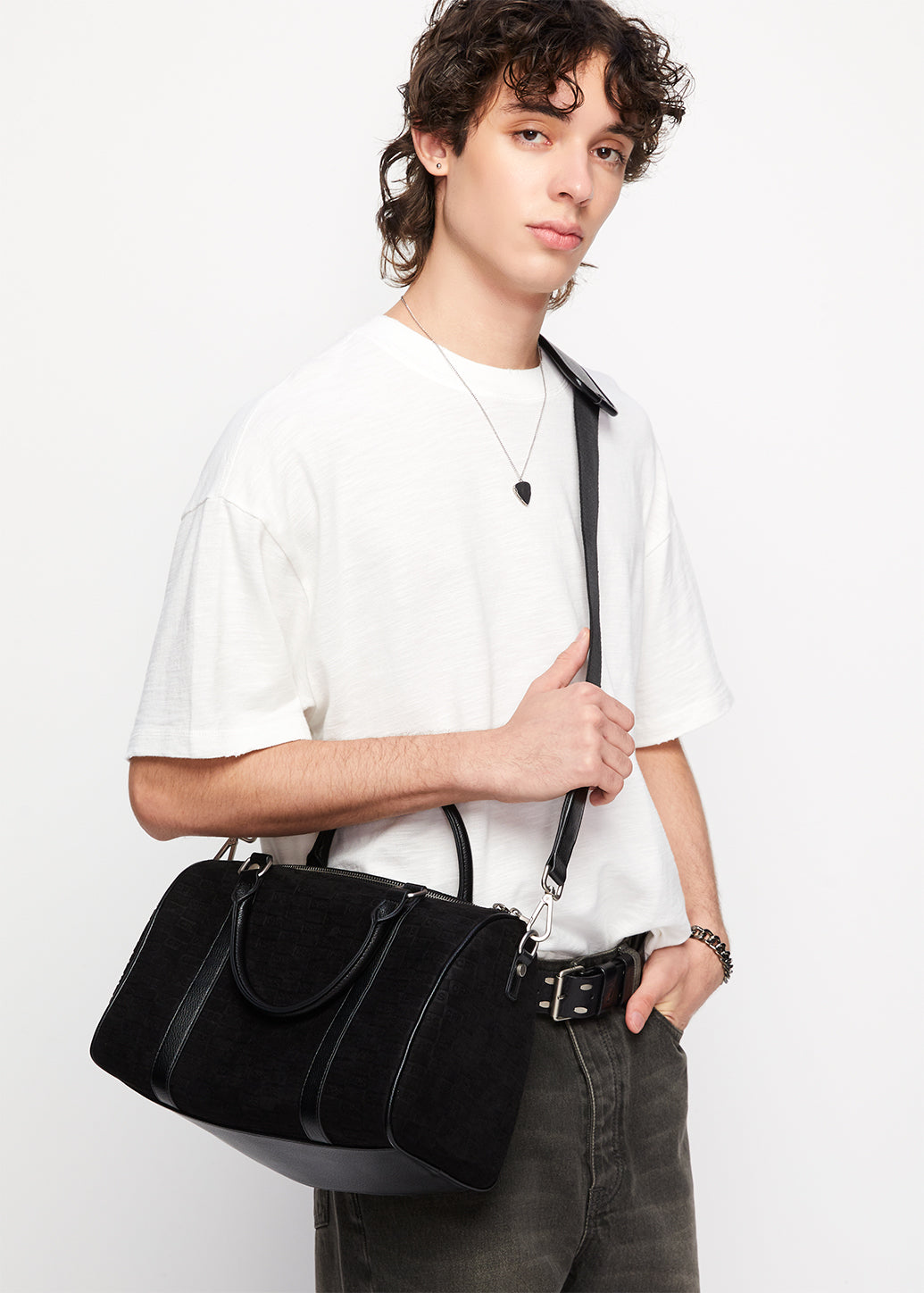 EMBOSSED MONOGRAM DUFFLE BAG