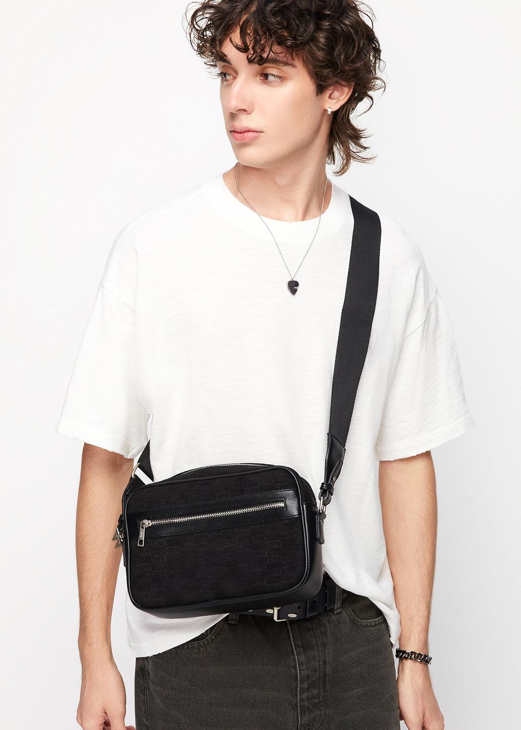 EMBOSSED MONOGRAM CROSSBODY BAG